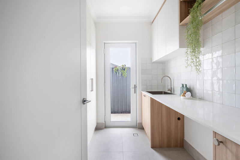 Laundry room neutral tones Mount Hawthorn Distinct Building Company