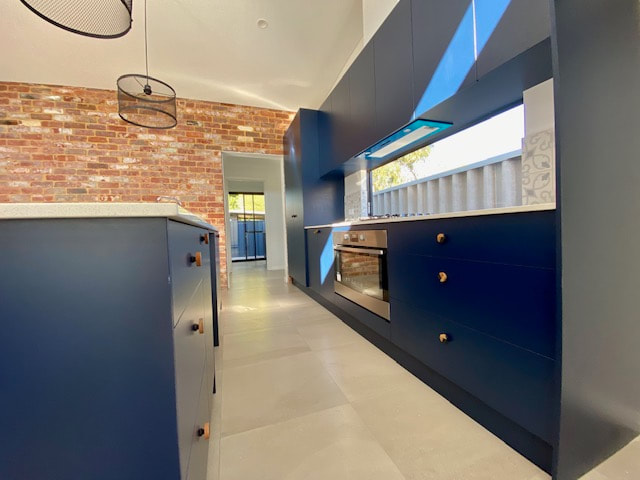 Feature brick wall Navy Kitchen Spearwood New Build Distinct Renovations